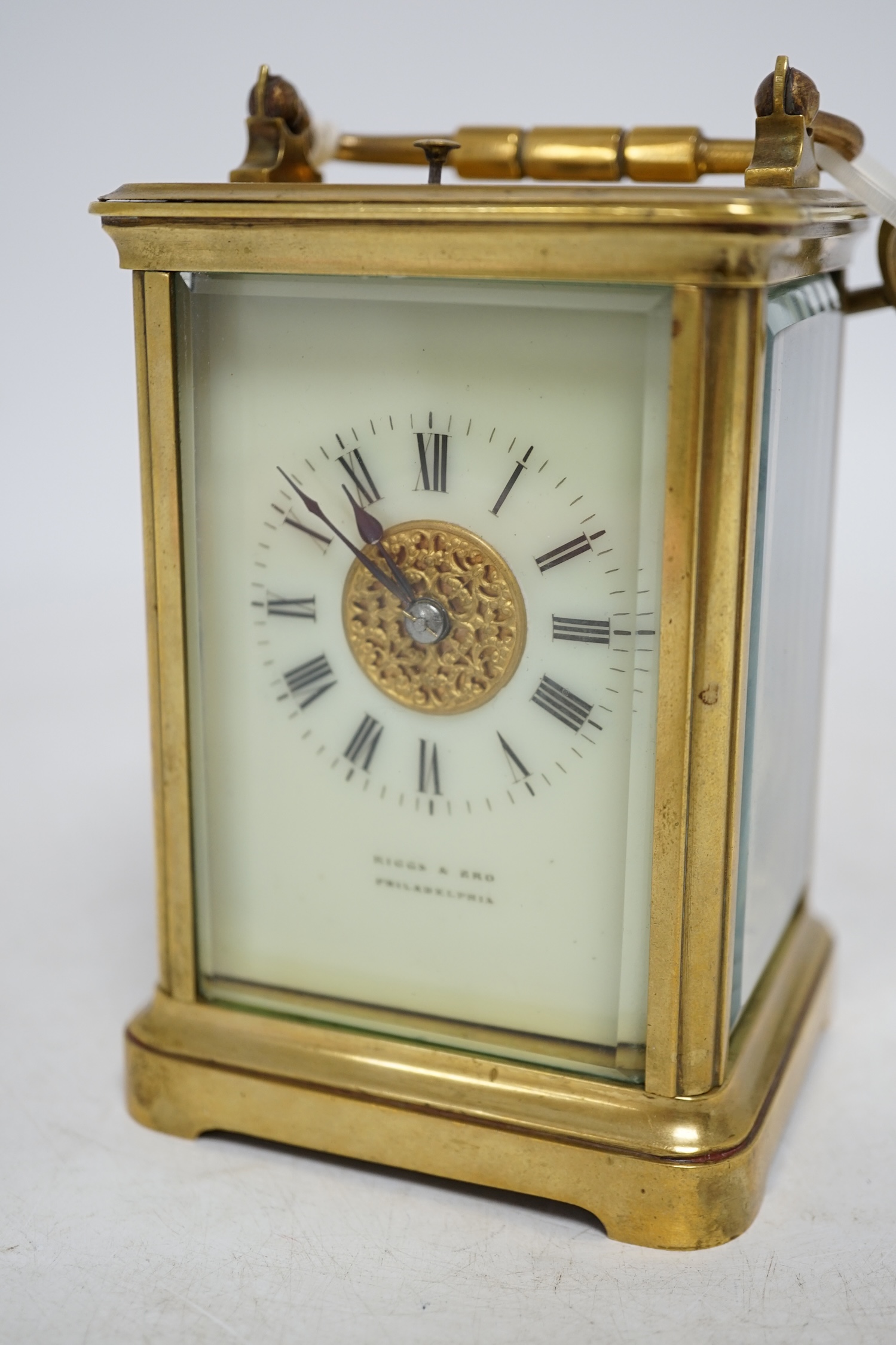 A brass cased repeating carriage clock with key, 14cm. Condition - good, currently ticking